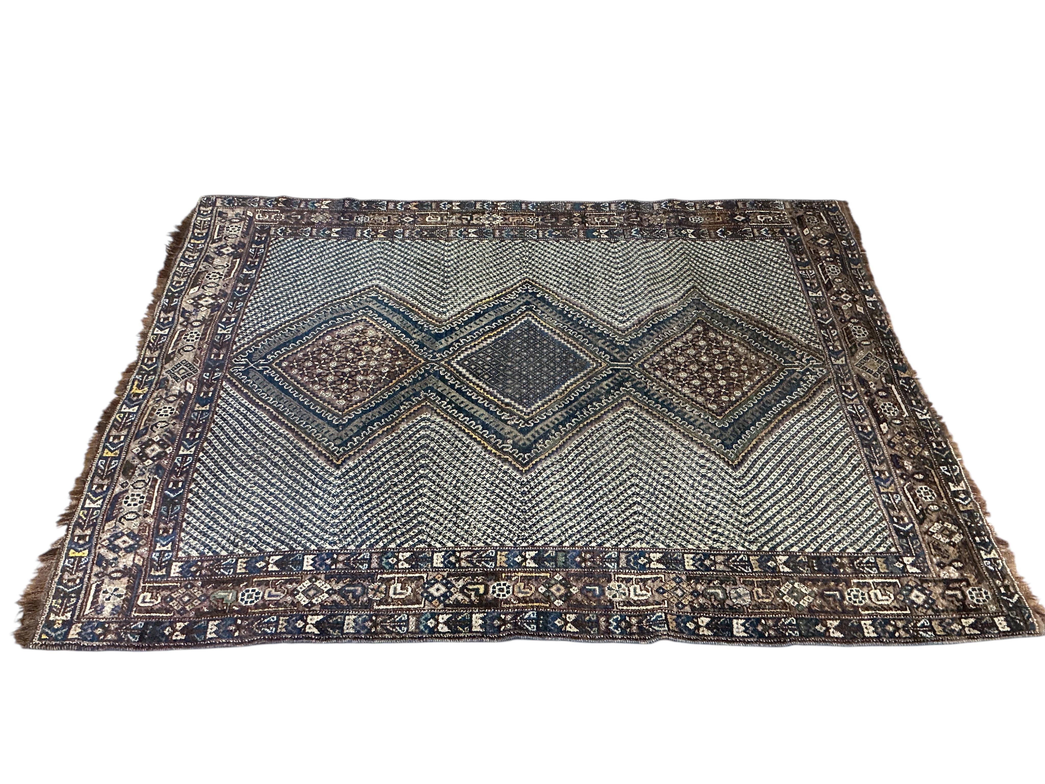 An Afshar blue ground rug, 176 x 130cm